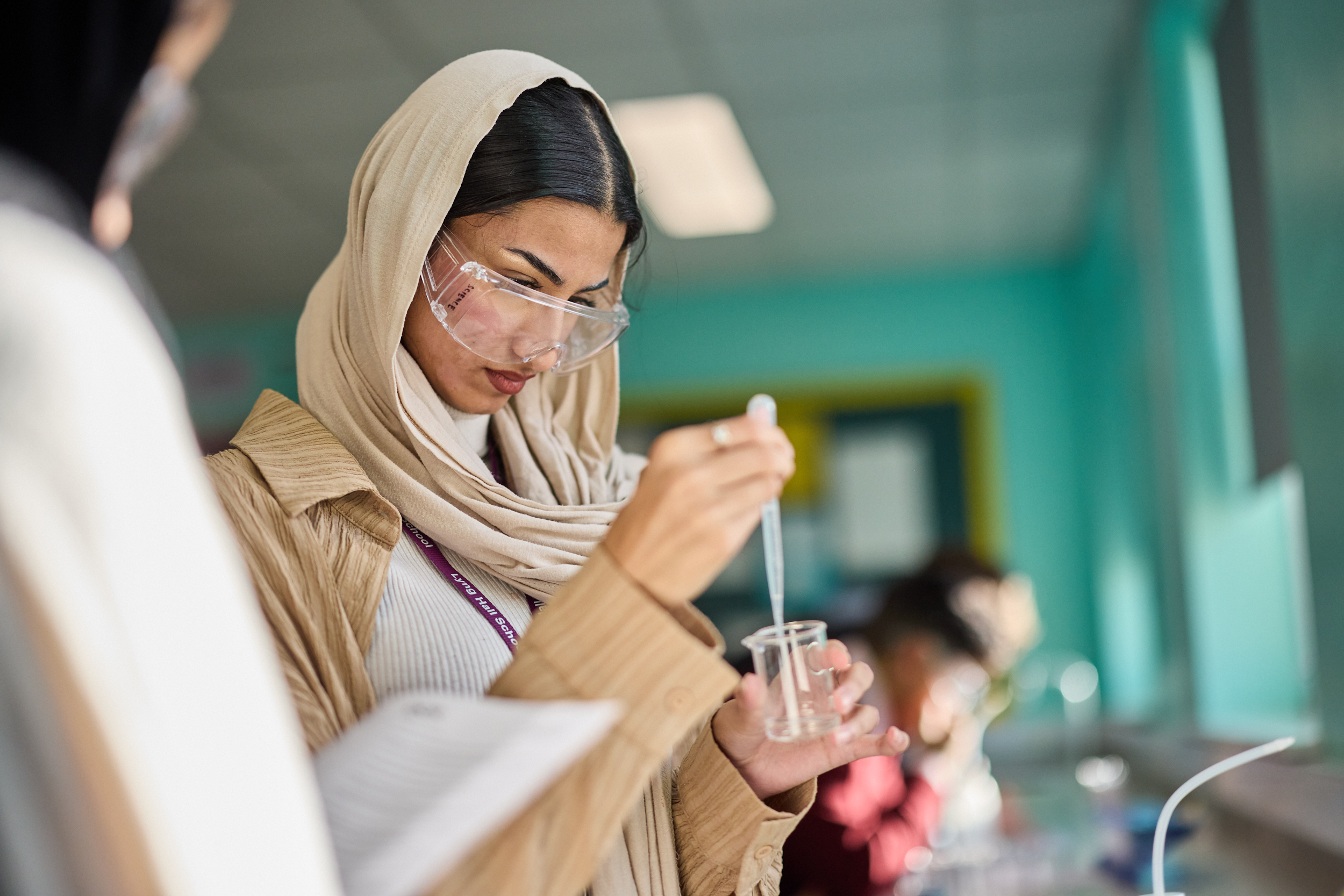 sixth form pupil in science lab