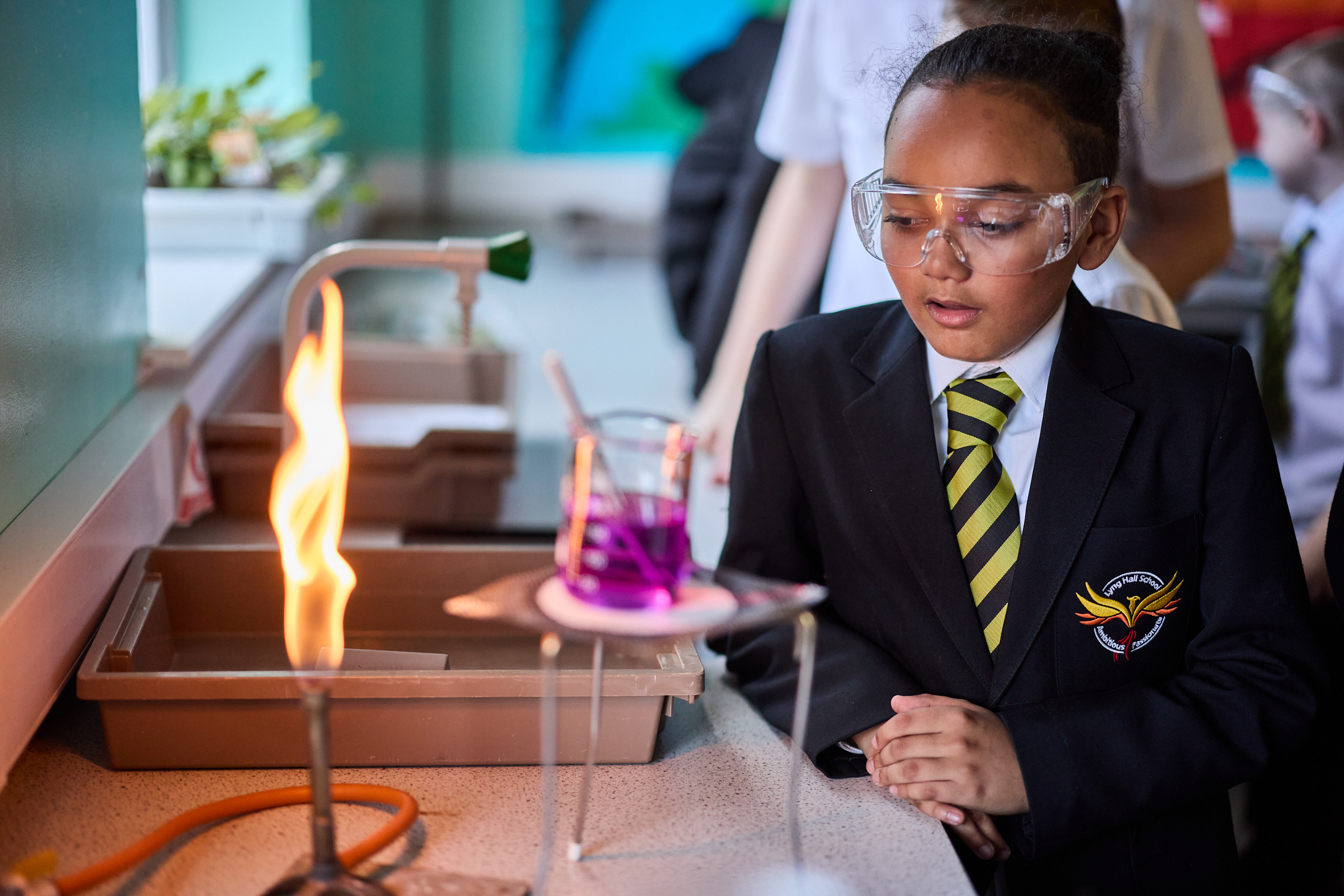 student in science class